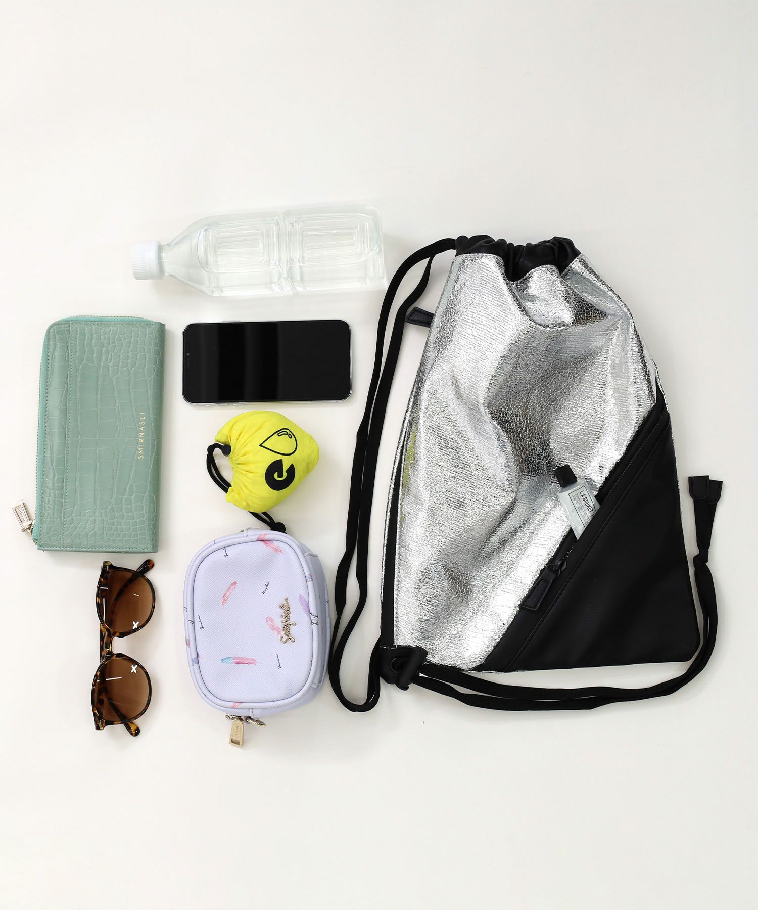 春夏物50％OFF】ナナノエル Nananoel lia トライアングルポケット